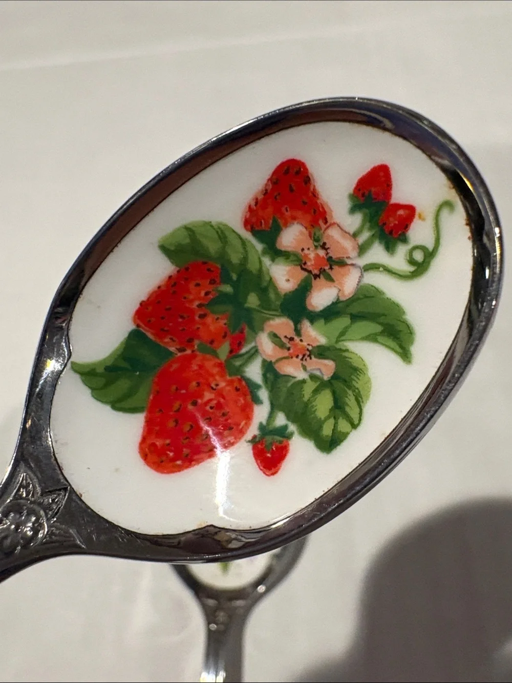 Avon collectors fruit spoons and hang rack